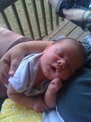 This is my little man at a few weeks old layin' on his Nanna